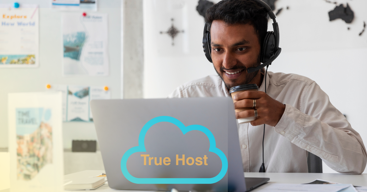Man working behind his laptop and the True host logo