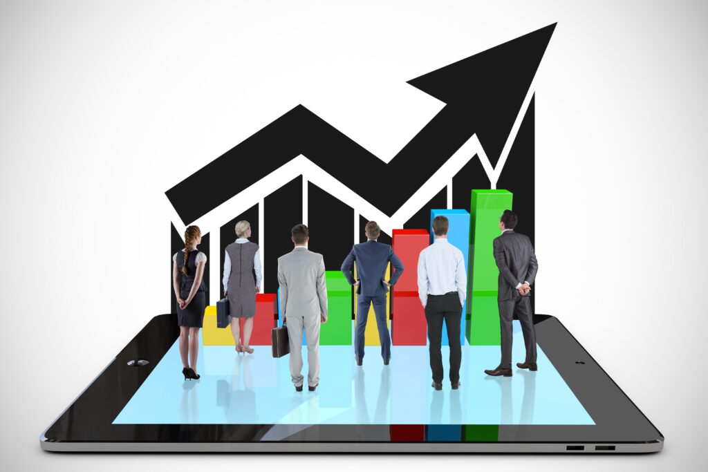 A group of men and women looing at the increasing stock prices and hence earning from Pakistani Stock Exchange.